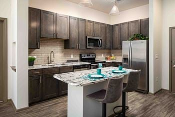 Kitchen with refrigerator